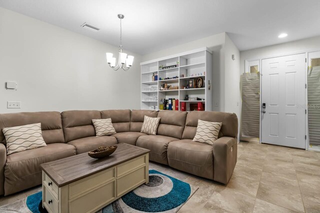 5006 Jackel Chase Dr, Wimauma, FL 33598 - living area with a chandelier and recessed lighting