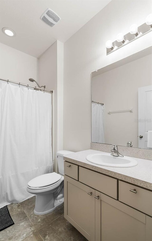 5006 Jackel Chase Dr, Wimauma, FL 33598 - bathroom featuring vanity, toilet, and a shower with curtain
