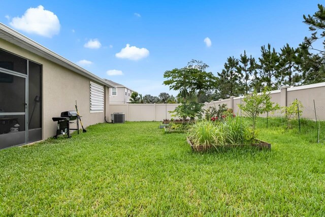 5006 Jackel Chase Dr, Wimauma, FL 33598 - view of yard featuring central AC unit
