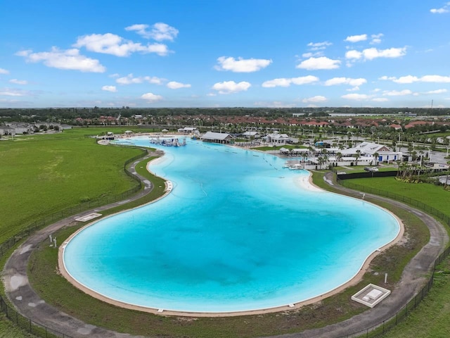 5006 Jackel Chase Dr, Wimauma, FL 33598 - view of swimming pool featuring a yard and a water view