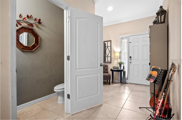 3901 Silverlake Way, Wesley Chapel, FL 33544 - entrance foyer with light tile patterned floors and crown molding