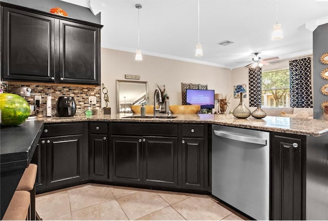3901 Silverlake Way, Wesley Chapel, FL 33544 - kitchen featuring stainless steel dishwasher, a sink, dark cabinets, and ornamental molding