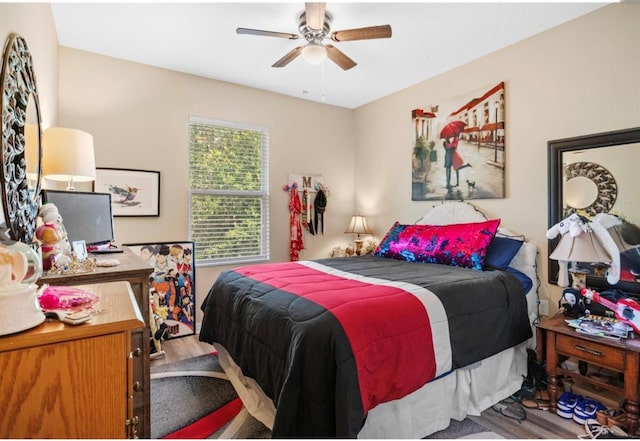 3901 Silverlake Way, Wesley Chapel, FL 33544 - bedroom featuring wood finished floors and a ceiling fan