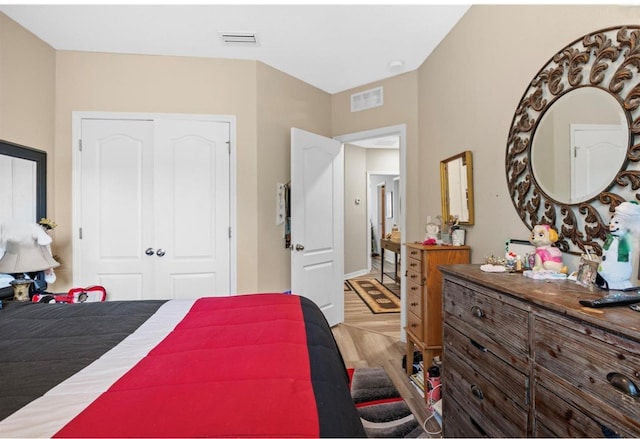 3901 Silverlake Way, Wesley Chapel, FL 33544 - bedroom featuring a closet and light wood-style floors