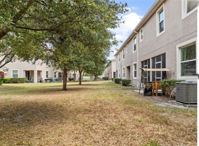3901 Silverlake Way, Wesley Chapel, FL 33544 - view of yard with central air condition unit and a residential view