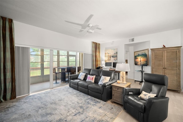 6330 99th Way N Unit 14B, Seminole, FL 33708 - living room with a ceiling fan