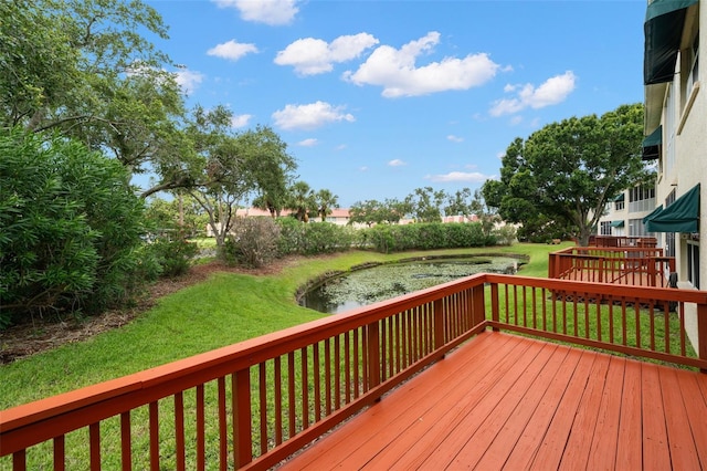 6330 99th Way N Unit 14B, Seminole, FL 33708 - deck with a lawn