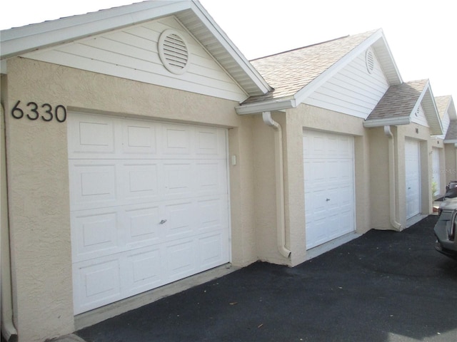6330 99th Way N Unit 14B, Seminole, FL 33708 - view of garage