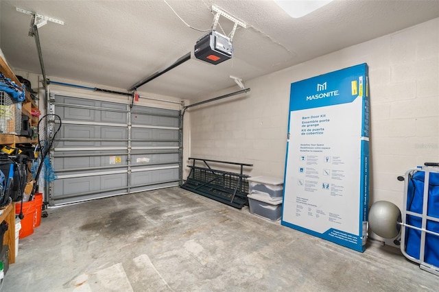 6330 99th Way N Unit 14B, Seminole, FL 33708 - garage with a garage door opener and concrete block wall