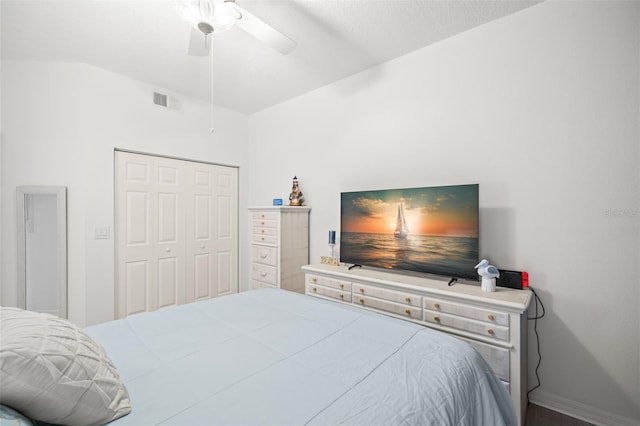 6330 99th Way N Unit 14B, Seminole, FL 33708 - bedroom featuring lofted ceiling, a closet, a ceiling fan, and baseboards
