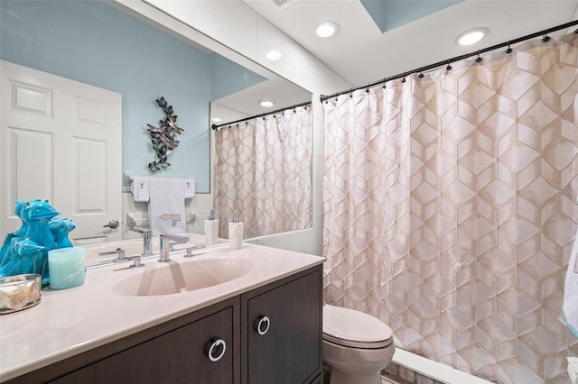 6330 99th Way N Unit 14B, Seminole, FL 33708 - full bath featuring toilet, vanity, recessed lighting, and a shower with shower curtain