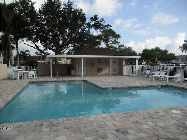 6330 99th Way N Unit 14B, Seminole, FL 33708 - community pool featuring a patio area