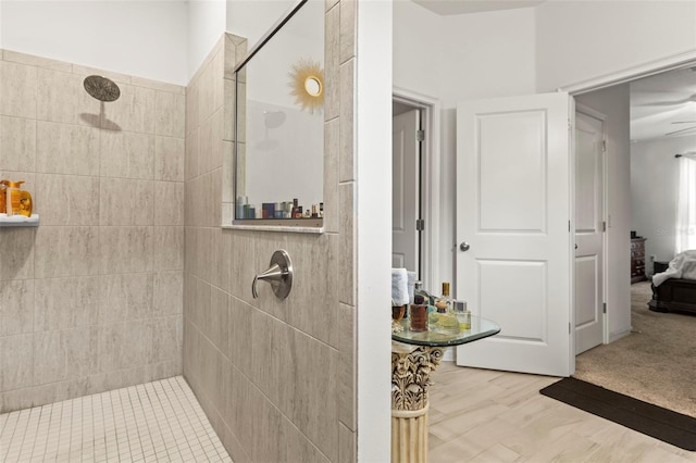944 Old Windsor Way, Spring Hill, FL 34609 - bathroom with a tile shower, ensuite bath, and ceiling fan