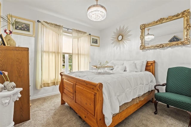 944 Old Windsor Way, Spring Hill, FL 34609 - carpeted bedroom featuring a chandelier and baseboards