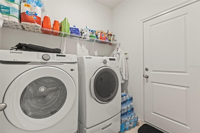 944 Old Windsor Way, Spring Hill, FL 34609 - laundry room featuring separate washer and dryer