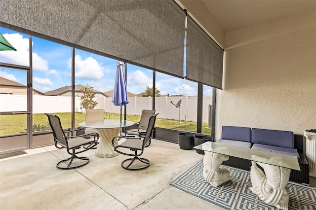 944 Old Windsor Way, Spring Hill, FL 34609 - sunroom / solarium with outdoor dining space and an outdoor living space
