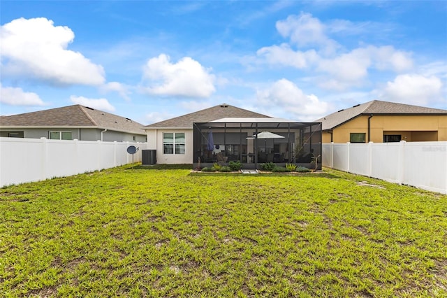 944 Old Windsor Way, Spring Hill, FL 34609 - back of property featuring stucco siding, central AC unit, and a lanai
