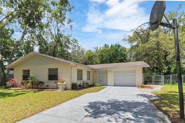 39721 Meadowood Loop, Zephyrhills, FL 33542 - ranch-style home with concrete driveway, a garage, a gate, and stucco siding