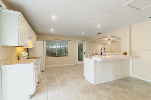 39721 Meadowood Loop, Zephyrhills, FL 33542 - kitchen featuring white electric range, a ceiling fan, light countertops, a peninsula, and recessed lighting