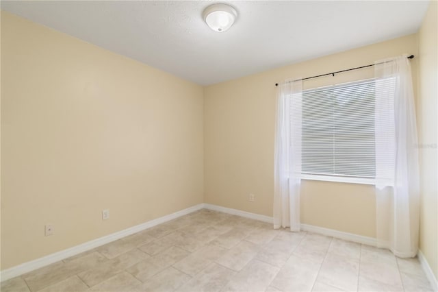 39721 Meadowood Loop, Zephyrhills, FL 33542 - empty room featuring baseboards