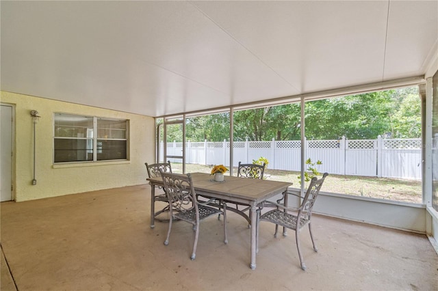 39721 Meadowood Loop, Zephyrhills, FL 33542 - sunroom / solarium featuring outdoor dining area