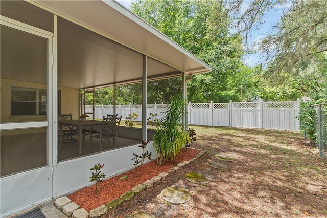 39721 Meadowood Loop, Zephyrhills, FL 33542 - view of yard with a sunroom
