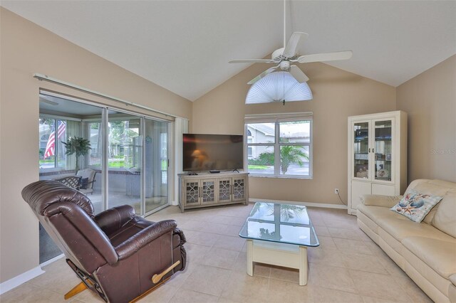 1111 Golfview Woods Dr Unit 1111, Sun City Center, FL 33573 - living area featuring a ceiling fan, baseboards, tile patterned floors, and high vaulted ceiling