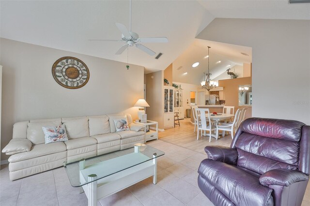 1111 Golfview Woods Dr Unit 1111, Sun City Center, FL 33573 - living room featuring ceiling fan, a chandelier, light tile patterned flooring, recessed lighting, and high vaulted ceiling