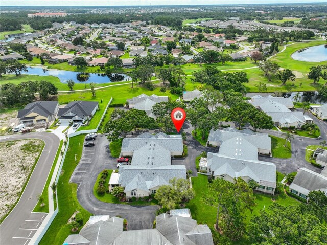 1111 Golfview Woods Dr Unit 1111, Sun City Center, FL 33573 - aerial view of property's location featuring nearby suburban area, a nearby body of water, and a golf club
