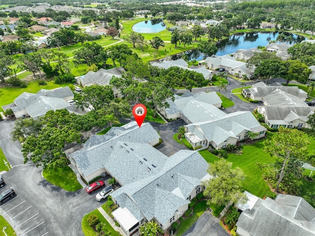 1111 Golfview Woods Dr Unit 1111, Sun City Center, FL 33573 - aerial perspective of suburban area with a nearby body of water