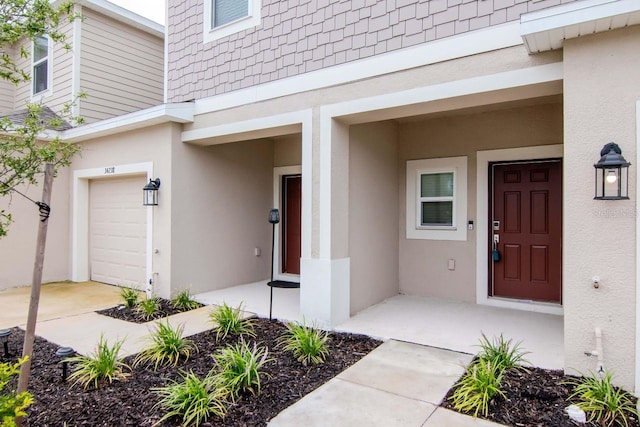 34234 Polacca Ln, Wesley Chapel, FL 33543 - entrance to property with stucco siding and an attached garage