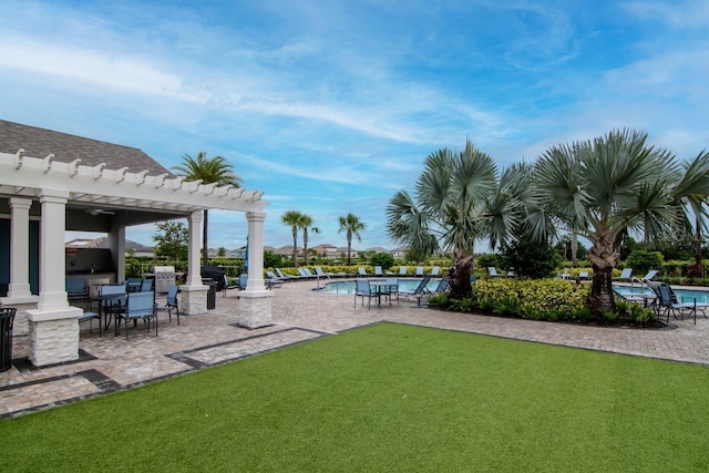 34234 Polacca Ln, Wesley Chapel, FL 33543 - view of grassy yard featuring a pergola, a community pool, and a patio area