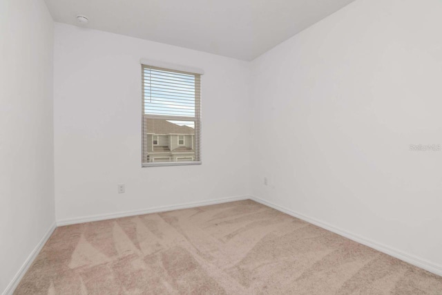 34234 Polacca Ln, Wesley Chapel, FL 33543 - unfurnished room with carpet floors and a smoke detector