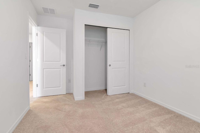 34234 Polacca Ln, Wesley Chapel, FL 33543 - unfurnished bedroom with light carpet and a closet