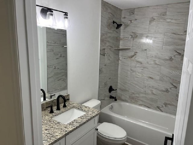 5635 NW 61st Ct, Ocala, FL 34482 - bathroom featuring toilet, vanity, and shower / tub combination