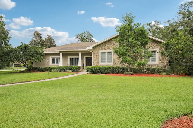 1803 143rd Ct E, Bradenton, FL 34212 - single story home featuring stone siding, a front lawn, and stucco siding
