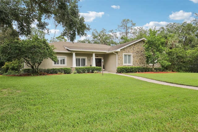 1803 143rd Ct E, Bradenton, FL 34212 - ranch-style house featuring stone siding, a front lawn, and stucco siding