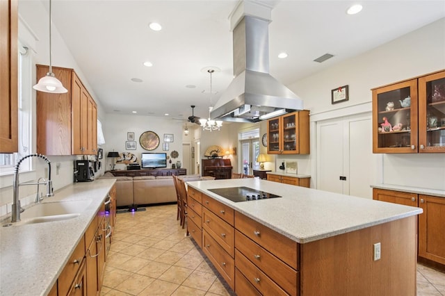 1803 143rd Ct E, Bradenton, FL 34212 - kitchen with black electric cooktop, island exhaust hood, a sink, ceiling fan, and a kitchen island