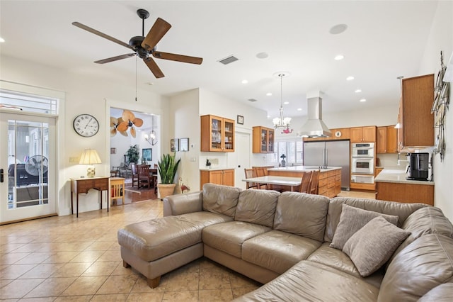 1803 143rd Ct E, Bradenton, FL 34212 - living area with light tile patterned floors, a chandelier, ceiling fan, and recessed lighting