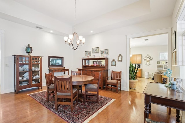 1803 143rd Ct E, Bradenton, FL 34212 - dining room featuring light wood finished floors, a chandelier, and recessed lighting