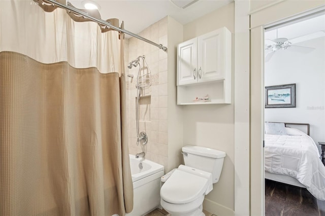 1803 143rd Ct E, Bradenton, FL 34212 - full bath with shower / tub combo, ensuite bathroom, toilet, ceiling fan, and baseboards