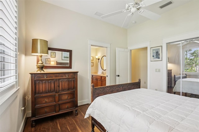 1803 143rd Ct E, Bradenton, FL 34212 - bedroom featuring dark wood finished floors, baseboards, a closet, ensuite bath, and a ceiling fan