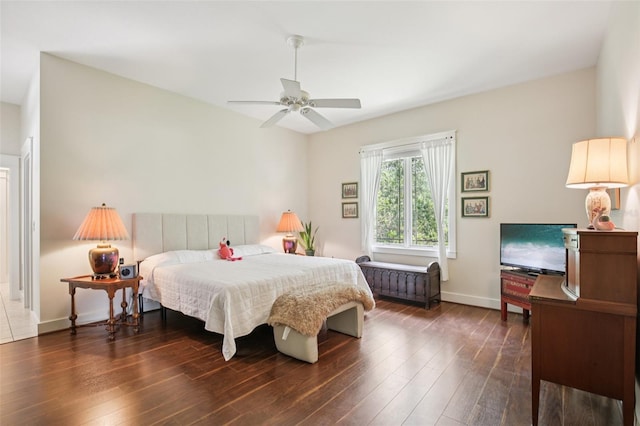 1803 143rd Ct E, Bradenton, FL 34212 - bedroom with dark wood finished floors, baseboards, radiator, and ceiling fan