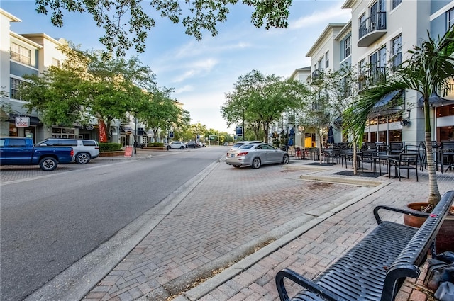 9608 Greenpointe Dr, Tampa, FL 33626 - view of asphalt street featuring sidewalks and curbs