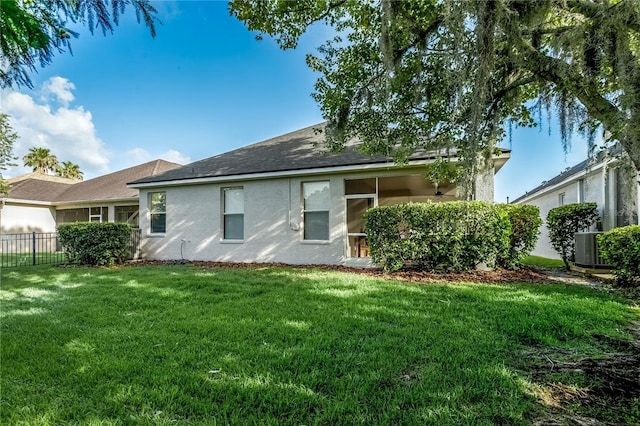 9608 Greenpointe Dr, Tampa, FL 33626 - back of house with stucco siding, cooling unit, and a shingled roof