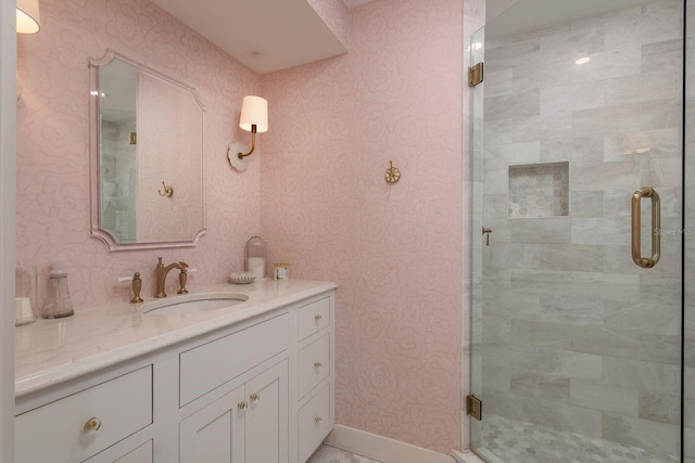 2395 Campbell Rd, Clearwater, FL 33765 - full bath with vanity, a shower stall, wallpapered walls, and baseboards