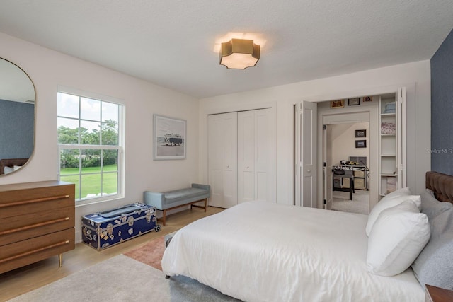 2395 Campbell Rd, Clearwater, FL 33765 - bedroom with a closet and wood finished floors
