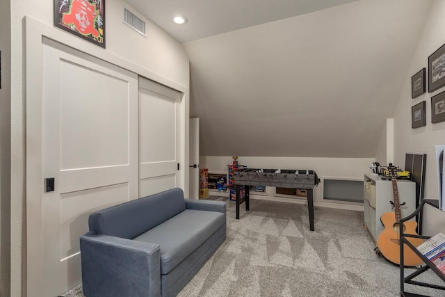 2395 Campbell Rd, Clearwater, FL 33765 - living area with lofted ceiling, light carpet, and recessed lighting