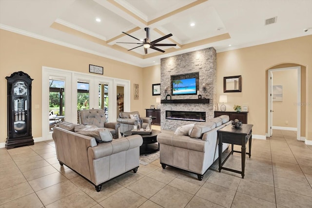 15415 Mulholland Rd, Parrish, FL 34219 - living area with arched walkways, light tile patterned flooring, ceiling fan, coffered ceiling, and beamed ceiling
