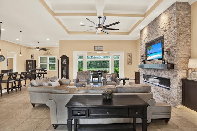 15415 Mulholland Rd, Parrish, FL 34219 - living area with a ceiling fan, light tile patterned flooring, coffered ceiling, a fireplace, and ornamental molding